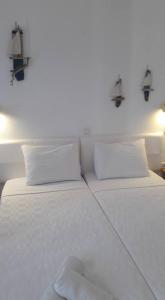 Posteľ alebo postele v izbe v ubytovaní Pavlos Rooms