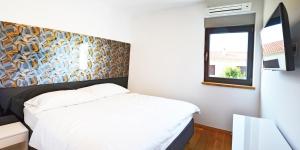 Postel nebo postele na pokoji v ubytování House Art + 32 fotografií