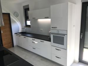 Kuchyň nebo kuchyňský kout v ubytování House Art