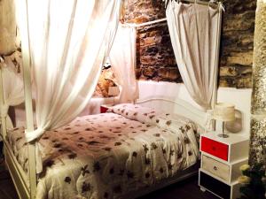 A bed or beds in a room at Cantina del Pescatore