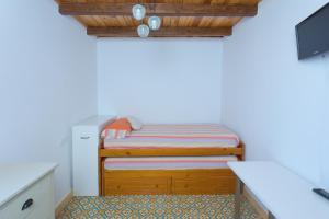 Giường trong phòng chung tại Casa de Campo La Estancia