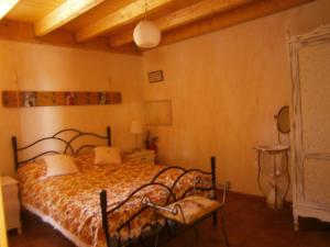 En eller flere senge i et værelse på Antiguo Molino de Aceite de Alforque