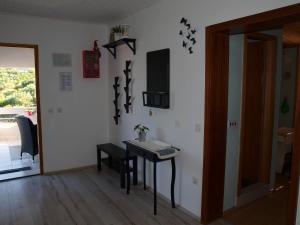 TV a/nebo společenská místnost v ubytování Apartment Duje