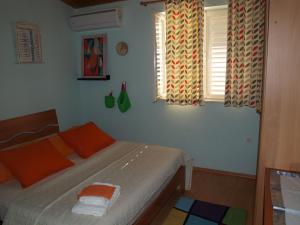 Postel nebo postele na pokoji v ubytování Apartment Duje