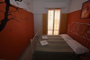 Postel nebo postele na pokoji v ubytování Sunflower Beach Backpacker Hostel & Bar