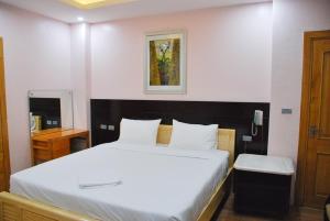 Voodi või voodid majutusasutuse Nice Hotel toas