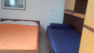 Postel nebo postele na pokoji v ubytování Apartment Dragovic
