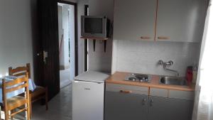 Kuchyň nebo kuchyňský kout v ubytování Apartment Dragovic