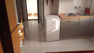 Kuchyň nebo kuchyňský kout v ubytování Apartment Dragovic