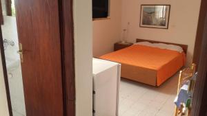 Postel nebo postele na pokoji v ubytování Apartment Dragovic
