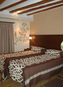Cama o camas de una habitación en El Molino de Floren