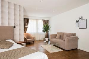Prostor za sedenje u objektu Hotel Alpha