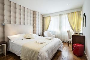 Krevet ili kreveti u jedinici u okviru objekta Hotel Alpha
