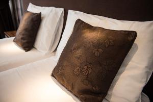 Krevet ili kreveti u jedinici u okviru objekta Hotel Alpha