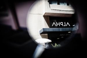 Sertifikat, nagrada, logo ili drugi dokument prikazan u objektu Hotel Alpha