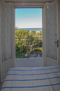 Postel nebo postele na pokoji v ubytování Hotel Annita Cervia