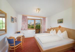 Letto o letti in una camera di Blasbichlerhof
