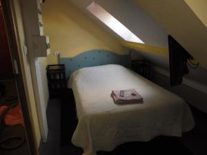 Łóżko lub łóżka w pokoju w obiekcie Studio Meublé Dijon