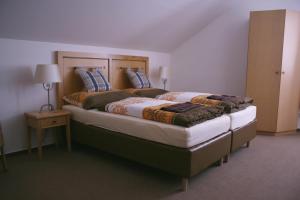 Postel nebo postele na pokoji v ubytování Statek Malčany