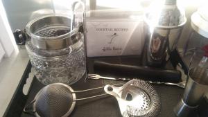 a kitchen counter with a whisk and a blender at Villa Baya in Ios Chora