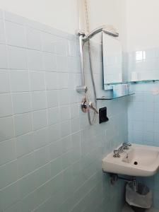 Ett badrum på Hotel Amados