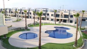 Bazén v ubytování Playa Elisa Bay nebo v jeho okolí