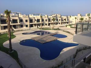 Bazén v ubytování Playa Elisa Bay nebo v jeho okolí