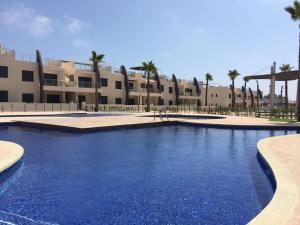 Bazén v ubytování Playa Elisa Bay nebo v jeho okolí