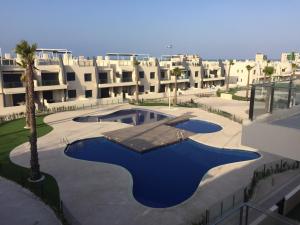 Bazén v ubytování Playa Elisa Bay nebo v jeho okolí