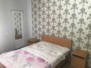 Voodi või voodid majutusasutuse Kvariati - Guest House toas