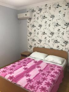 Voodi või voodid majutusasutuse Kvariati - Guest House toas