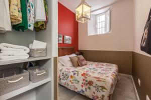 Posteľ alebo postele v izbe v ubytovaní Apartamentos Mariscal