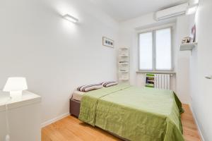 Ένα ή περισσότερα κρεβάτια σε δωμάτιο στο Micol's Place, 2 rooms, 2 bathrooms, 80 mq