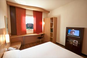 TV a/nebo společenská místnost v ubytování Hotel Rafael