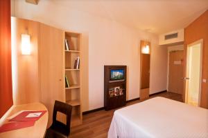 TV a/nebo společenská místnost v ubytování Hotel Rafael