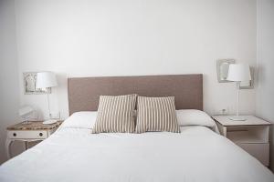 Posteľ alebo postele v izbe v ubytovaní Apartamento Mendoza