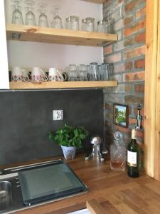 Kuchnia lub aneks kuchenny w obiekcie Dom Mossa