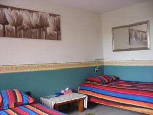 Postel nebo postele na pokoji v ubytování B&B-Edam