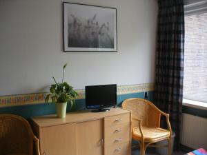 TV a/nebo společenská místnost v ubytování B&B-Edam
