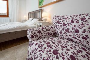 Postel nebo postele na pokoji v ubytování Apartmány Pod náměstím