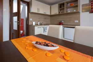 Kuchyň nebo kuchyňský kout v ubytování Apartmány Pod náměstím