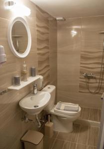 Ett badrum på Hotel Antiparos