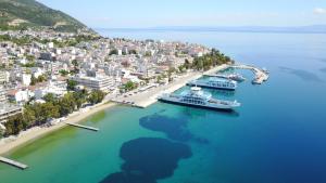 an aerial view of a cruise ship in a harbor at Calypso Beach Hotel in Loutra Edipsou