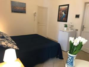 Postel nebo postele na pokoji v ubytování Clorinda - Immobilevante