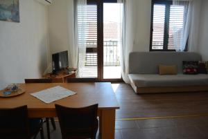 TV a/nebo společenská místnost v ubytování Apartment familie