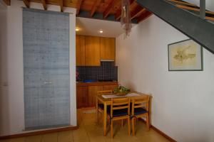 Foto da galeria de Casa de Pedra em Ribeira Quente