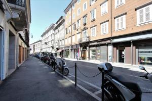 a street with bikes parked on the side of the road at Residenza Corso Saba in Trieste