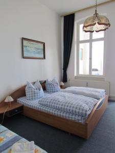 Postel nebo postele na pokoji v ubytování Villa Freya