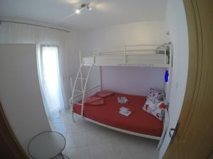 Posteľ alebo postele v izbe v ubytovaní Dimi Apartments