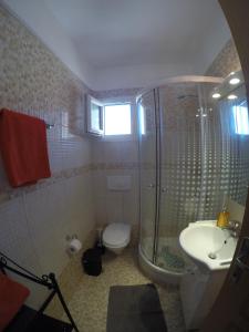 Kúpeľňa v ubytovaní Dimi Apartments